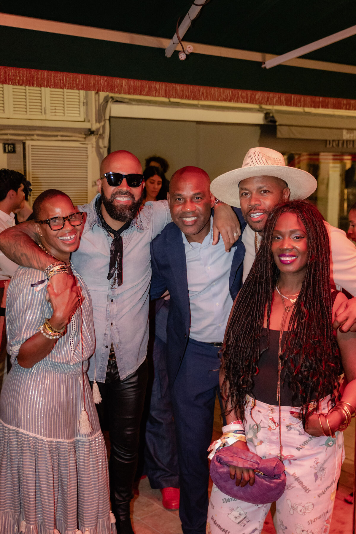 Group of guests embracing candidly