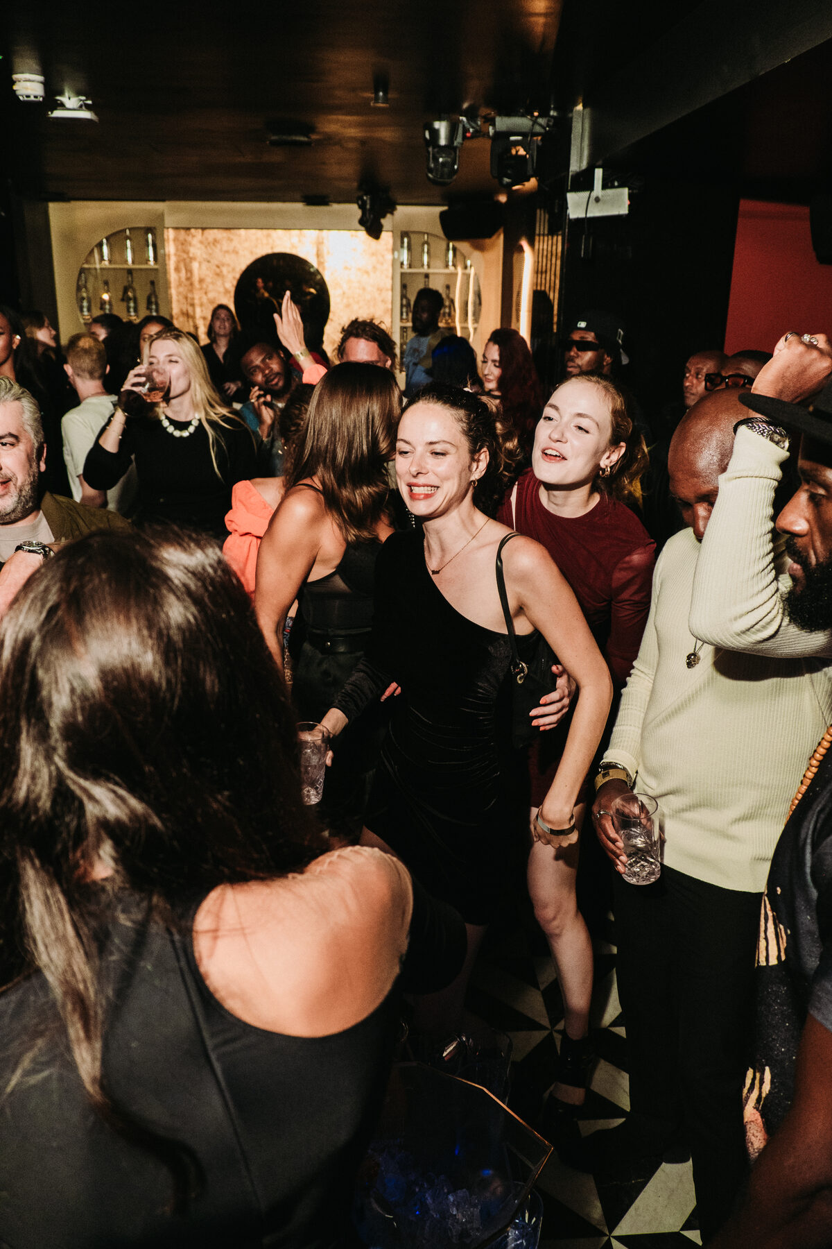 Guests dancing together at the after-party