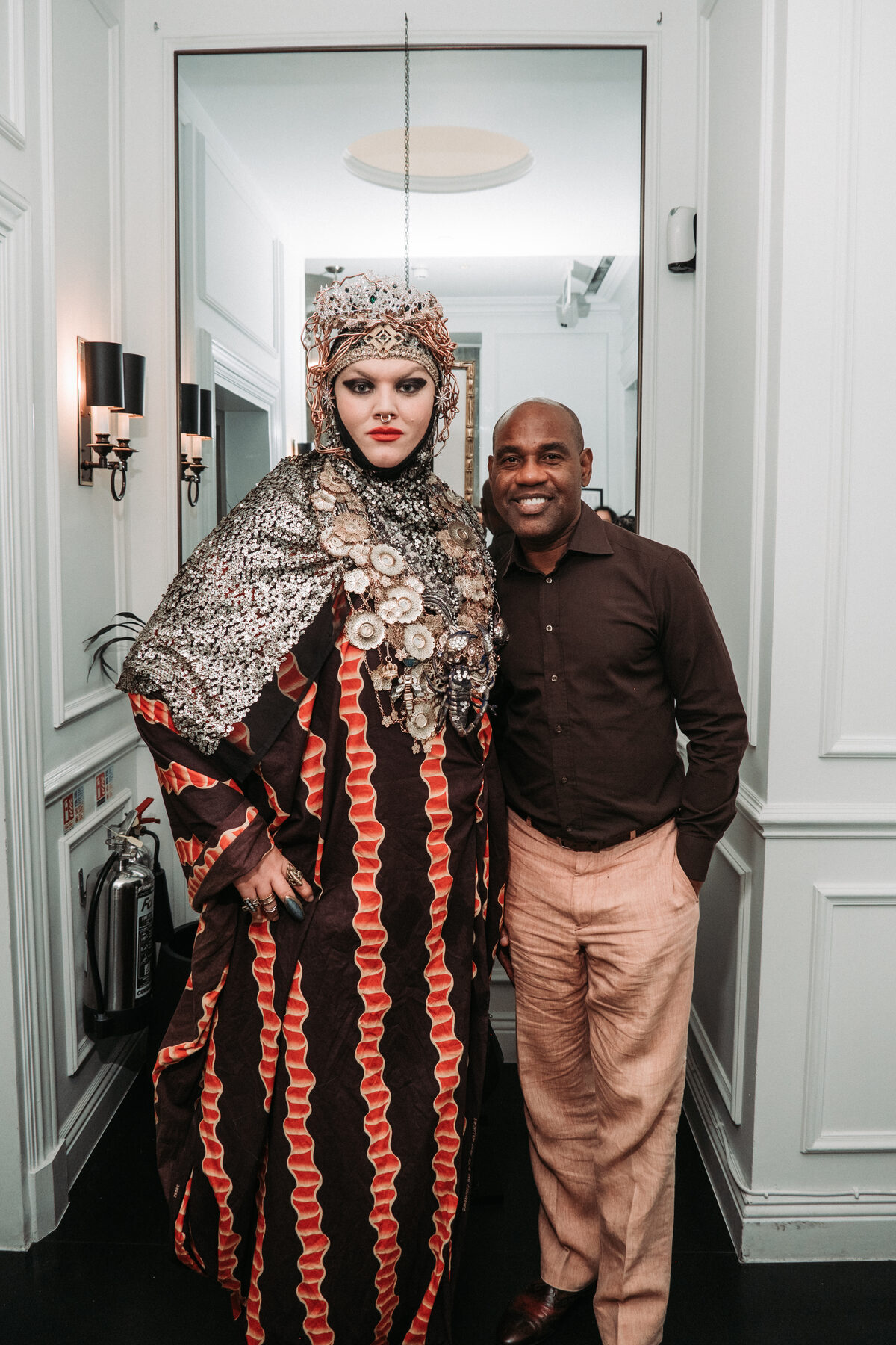 Guests in elaborate carnival-inspired outfits